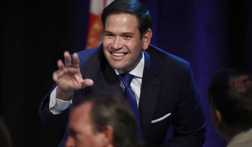 Sen. Marco Rubio, R-Fla., waves before he speaks during a Forum Club meeting on Wednesday, Aug. 21, 2019, in West Palm Beach, Fla. (AP Photo/Brynn Anderson) **FILE**