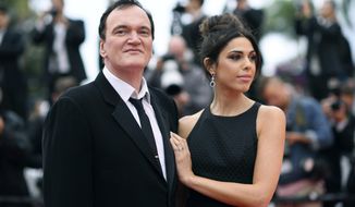 FILE - In this May 18, 2019 file photo, film director Quentin Tarantino and his wife Daniela Pick pose for photographers upon arrival at the premiere of the film &amp;quot;The Wild Goose Lake&amp;quot; at the 72nd international film festival, Cannes, southern France. Tarantino is about to become a father. His representative Katherine Rowe says the “Once Upon a Time... In Hollywood” director and his wife, Israeli model and singer Pick, are expecting a baby. The couple met in 2009 and married last November. It’s the first child for the 56-year-old Tarantino, who also directed “Pulp Fiction” and “Reservoir Dogs,” and the 35-year-old Pick. (Photo by Arthur Mola/Invision/AP, File)