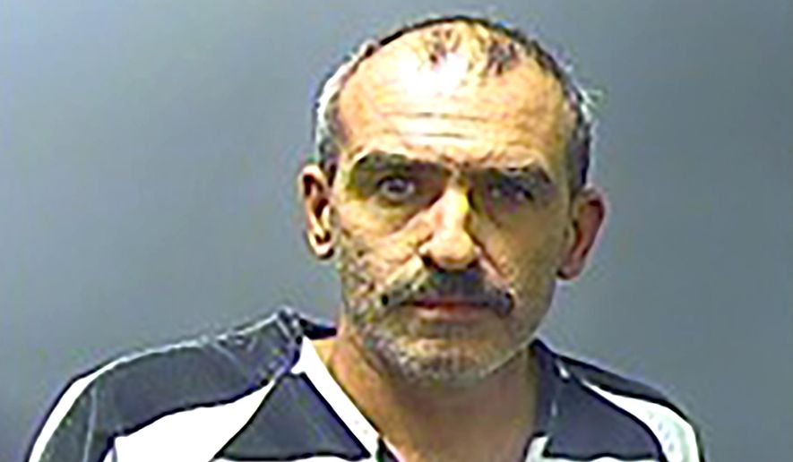 In this March 14, 2018 booking photo provided by the Baxter County, Arkansas Sheriff's Office is Rick Allen Headley. Headley has been sentenced to life in prison without parole after pleading guilty Tuesday to capital murder for the March 2018 stabbing death of his estranged wife, Kirstie Headley, in Mountain Home, Ark., which was captured on surveillance video. (Baxter County Sheriff's Office via AP)