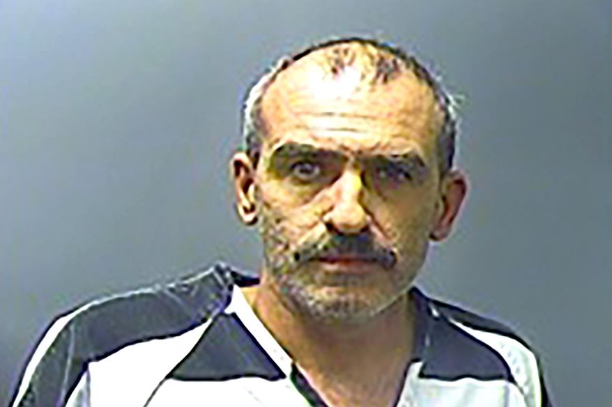 In this March 14, 2018 booking photo provided by the Baxter County, Arkansas Sheriff's Office is Rick Allen Headley. Headley has been sentenced to life in prison without parole after pleading guilty Tuesday to capital murder for the March 2018 stabbing death of his estranged wife, Kirstie Headley, in Mountain Home, Ark., which was captured on surveillance video. (Baxter County Sheriff's Office via AP)