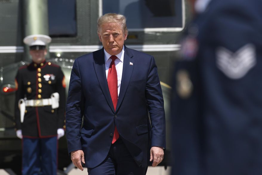 President Donald Trump walks from Marine One to Air Force One at Andrews Air Force Base in Md., Wednesday, Aug. 21, 2019. Trump is traveling to Louisville, Ky., to deliver remarks to the American Veterans (AMVETS) 75th National Convention. (AP Photo/Susan Walsh)
