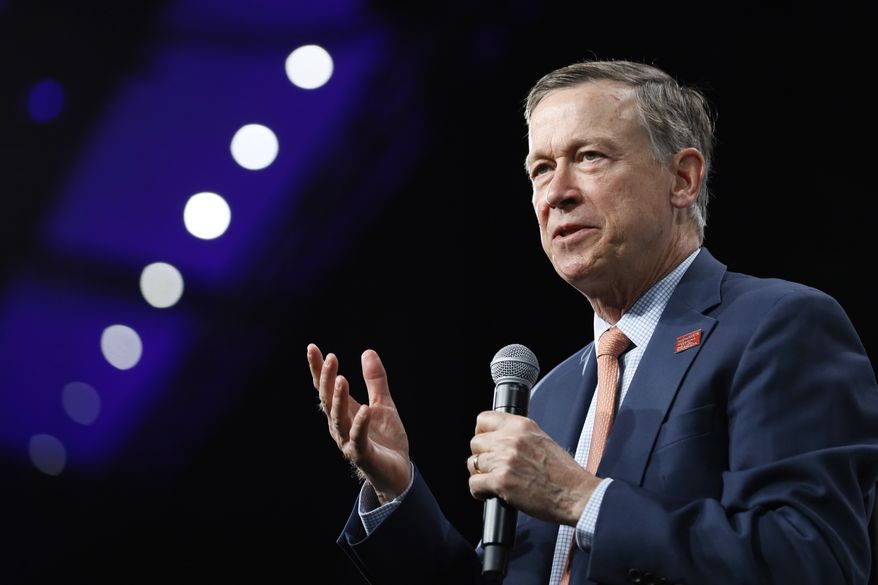 In this Aug. 10, 2019, file photo, then-Democratic presidential candidate former Colorado Gov. John Hickenlooper speaks at the Presidential Gun Sense Forum, in Des Moines, Iowa. Former Colorado Gov. Hickenlooper said Thursday, Aug. 22, that he will run for the U.S. Senate, becoming the immediate front-runner in a crowded Democratic field vying for the right to challenge Republican incumbent Cory Gardner. (AP Photo/Charlie Neibergall, File) **FILE**
