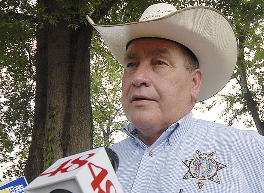 FILE - In this July, 9, 2008 file photo, Limestone County, Ala., Sheriff Mike Blakely speaks to the media following the crash of a small airplane. Blakely, who is in his 10th term in office, was arrested on Thursday, Aug. 22, 2019, on multiple theft and ethics charges, according to the Alabama attorney general's office. (Kim Rynders/Athens News Courier via AP)