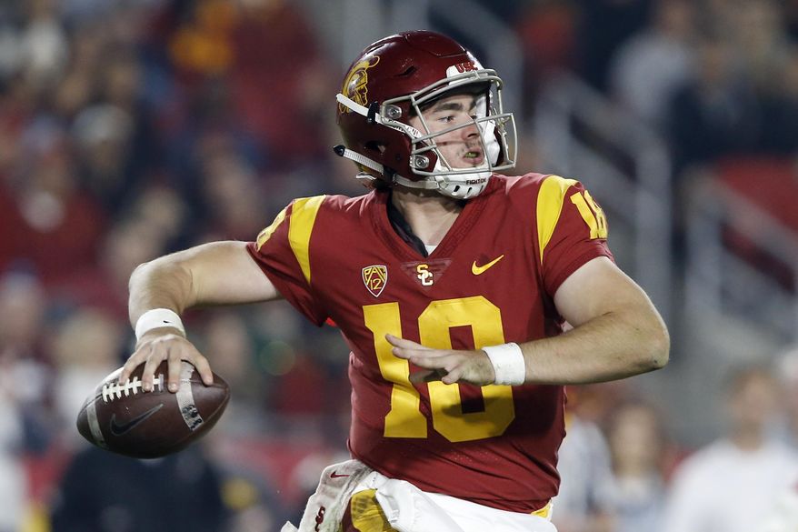 FILE - In this Nov. 10, 2018, file photo, Southern California quarterback JT Daniels (18) throws a pass during the second half of an NCAA college football game against California in Los Angeles. Sophomore J.T. Daniels was resolute he is the best man for the job after retaining his starting job. (AP Photo/Alex Gallardo, File)
