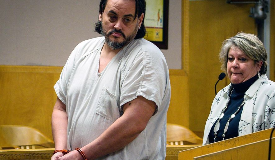 In this Feb., 15, 2019 photo, Zachary David O'Neill, left, walks into court with his lawyer Kris Copenhaver for his arraignment on charges of attempted murder and rape in Billings, Mont. On Friday, Aug. 23, 2019 O'Neill, 39, is expected to be sentenced to life in prison after pleading guilty last month to murder and the attempted killing and rape of another victim during the same time period. (Adam Fondren/The Billings Gazette via AP)