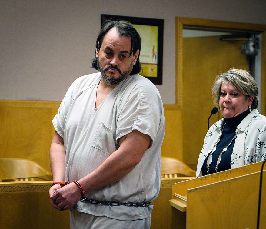In this Feb., 15, 2019 photo, Zachary David O'Neill, left, walks into court with his lawyer Kris Copenhaver for his arraignment on charges of attempted murder and rape in Billings, Mont. On Friday, Aug. 23, 2019 O'Neill, 39, is expected to be sentenced to life in prison after pleading guilty last month to murder and the attempted killing and rape of another victim during the same time period. (Adam Fondren/The Billings Gazette via AP)