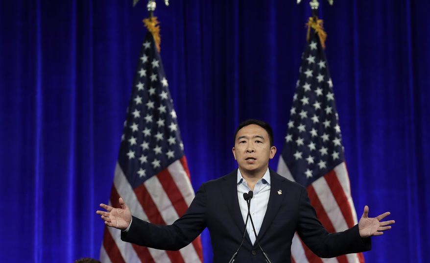 Democratic presidential candidate Andrew Yang gestures while speaking at the Democratic National Committee&#39;s summer meeting Friday, Aug. 23, 2019, in San Francisco. (AP Photo/Ben Margot) ** FILE **