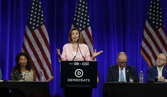 U.S. House Speaker Nancy Pelosi gestures while speaking at the Democratic National Committee&#39;s summer meeting Friday, Aug. 23, 2019, in San Francisco. More than a dozen Democratic presidential hopefuls are making their way to California to curry favor with national party activists from around country. Democratic National Committee members will hear Friday from top contenders, including Elizabeth Warren, Kamala Harris and Bernie Sanders. (AP Photo/Ben Margot)
