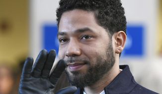 In this March 26, 2019, file photo, actor Jussie Smollett smiles and waves to supporters before leaving Cook County Court after his charges were dropped in Chicago. An Illinois judge seems close to appointing a special prosecutor to look into why state prosecutors abruptly dropped charges against Smollett accusing him of staging a racist, anti-gay attack against himself. A hearing Friday, Aug. 23 will be one of the first opportunities for Judge Michael Toomin to name someone since his surprise ruling in June that a special prosecutor was warranted. Among the options available to a special prosecutor would be to restore charges against Smollett.  (AP Photo/Paul Beaty, File) **FILE**