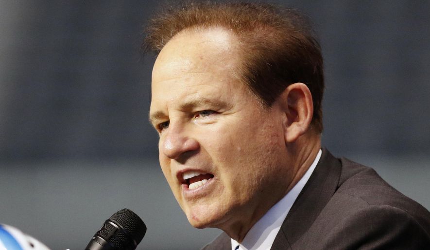 FILE - In this July 15, 2019, file photo, Kansas head coach Les Miles speaks on the first day of Big 12 Conference NCAA college football media days in Arlington, Texas. Les Koenning has to be careful every time the new offensive coordinator at Kansas walks into one of the Jayhawks’ meeting rooms, making sure to address the right person by the right name. There’s Miles Kendrick and Miles Fallin, Manny Miles and Ben Miles. Throw in new coach Les Miles and you have miles and miles of Miles in Lawrence these days. (AP Photo/David Kent, File)