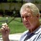 FILE - In this July 24, 2000, file photo, Pat Summerall, lead play-by-play announcer for the NFL on Fox Sports, announces his retirement during a news conference in the Century City section of Los Angeles. Summerall transitioned from a successful playing career to the booth in the 1960s and became the voice of the NFL. He started off as an analyst and was part of the first Super Bowl. He shifted to a play-by-play role in 1974 at CBS and that is where he really shined. (AP Photo/Nick Ut, File)