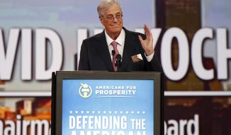FILE - In this Aug. 1, 2015 file photo, Chairman of the board of Americans for Prosperity David Koch speaks at the Defending the American Dream summit hosted by Americans for Prosperity at the Greater Columbus Convention Center in Columbus, Ohio.  Koch, a major donor to conservative causes and educational groups, has died on Friday, Aug. 23, 2019. He was 79.  (AP Photo/Paul Vernon, File)