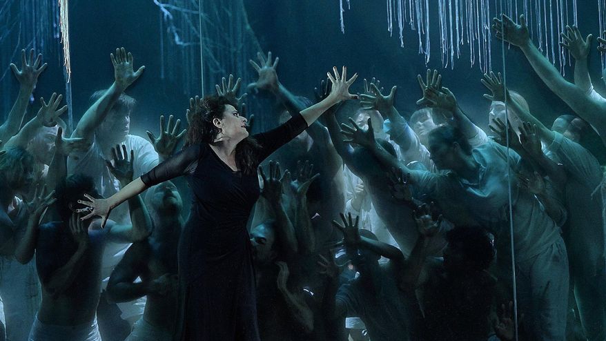 This photo provided by Salzburg Festival shows Cecilia Bartoli from the 2019 Salzburg Festival's production of the opera "Alcina"  in Salzburg, Austria.  The many fans of  Bartoli have been waiting more than a decade hoping the Italian mezzo-soprano would return to perform in the United States again. Now she agrees “it's time” and jokes that at age 53 she needs to do it before she reaches retirement age.   (Matthias Horn/Salzburg Festival via AP)