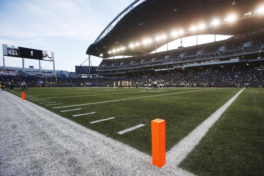 Pylons mark the modified end zone during the first half of an NFL preseason football game between the Oakland Raiders and the Green Bay Packers on Thursday, Aug. 22, 2019, in Winnipeg, Manitoba. (John Woods/The Canadian Press via AP)