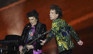 Ron Wood, left, and Mick Jagger of the Rolling Stones perform during the band&#x27;s concert at the Rose Bowl, Thursday, Aug. 22, 2019, in Pasadena, Calif. (Photo by Chris Pizzello/Invision/AP)