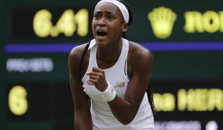 FILE - In this July 5, 2019, file photo, United States&#39; Cori &amp;quot;Coco&amp;quot; Gauff reacts after winning a point against Slovenia&#39;s Polona Hercog in a Women&#39;s singles match during day five of the Wimbledon Tennis Championships in London. Gauff is just 15 but got into the main draw for the U.S. Open, which starts next week, thanks to a wild-card invitation after her surprising run to the fourth round at Wimbledon. She is one of a group of young Americans making strides in tennis lately. (AP Photo/Ben Curtis, File)