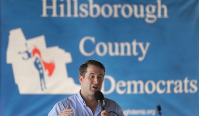 Democratic presidential candidate Rep. Seth Moulton, D-Mass., addresses an audience, Sunday, Aug. 18, 2019, at the Hillsborough County Democrats Summer Picnic, in Greenfield, N.H. (AP Photo/Steven Senne)