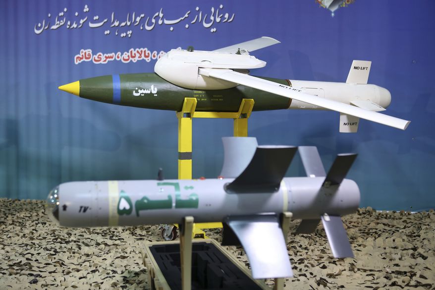 This photo released by the official website of the Iranian Defense Ministry on Aug. 8, 2019, shows Iranian-made smart bombs during an unveiling ceremony, Iran. The semi-official ILNA news agency quoted Iranian Gen. Mohsen Rezaei on Sunday, Aug. 25, 2019, as denying claims by the Israeli military that it thwarted an imminent Iranian drone attack on Israel, calling that a &quot;lie.&quot; (Iranian Defense Ministry via AP)