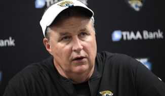 FILE - In this Aug. 8, 2019, file photo, Jacksonville Jaguars head coach Doug Marrone talks to reporters after an NFL football preseason game against the Baltimore Ravens in Baltimore. Jaguars running back Leonard Fournette insists he’s made professional progress. Coach Doug Marrone is hesitant to agree. Marrone says “we are going to see.” This much everyone is certain: Fournette’s performance on and off the field will go a long way toward determining whether the Jaguars remain at the bottom of the AFC South or return to being conference contenders in 2019. (AP Photo/Nick Wass, File)