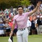Rory McIlroy waves to the gallery after winning the Tour Championship golf tournament and The FedEx Cup Sunday, Aug. 25, 2019, at East Lake Golf Club in Atlanta. (AP Photo/John Amis)