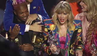 Taylor Swift accepts the video of the year award for &amp;quot;You Need to Calm Down&amp;quot; at the MTV Video Music Awards at the Prudential Center on Monday, Aug. 26, 2019, in Newark, N.J. (Photo by Matt Sayles/Invision/AP)