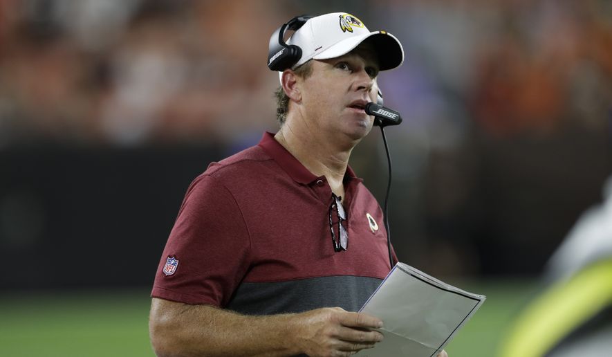 Washington Redskins head coach Jay Gruden watches from the sideline during the second half of an NFL preseason football game against the Cleveland Browns, Thursday, Aug. 8, 2019, in Cleveland. (AP Photo/Ron Schwane)