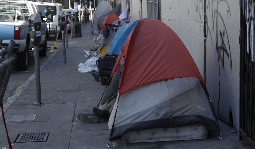 Homeless tents are shown along a street in San Francisco, Wednesday, Aug. 21, 2019. (AP Photo/Jeff Chiu)