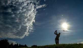 Stacy Lewis tees off on the third hole during the first round of the CP Women&#x27;s Open in Aurora, Ontario, Thursday Aug. 22, 2019. (Frank Gunn/The Canadian Press via AP)