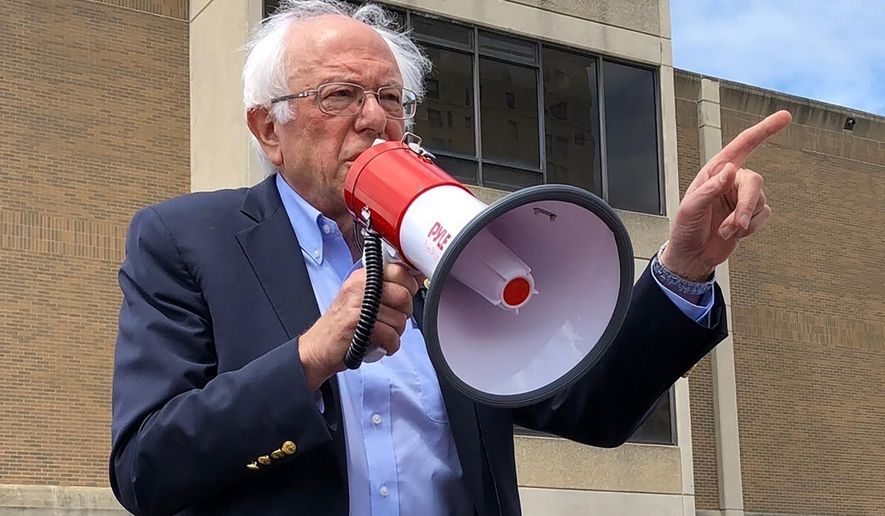 Democratic presidential candidate Bernie Sanders speaks to striking telecommunications workers on Sunday, Aug. 25, 2019, in Louisville, Ky. Sanders says it’s possible to be a friend of coal miners and a believer in climate change and the need for cleaner energy sources to combat it. (AP Photo/Bruce Schreiner)