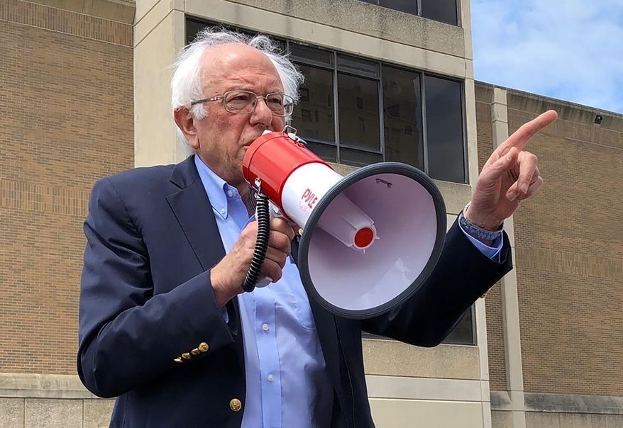 Democratic presidential candidate Bernie Sanders speaks to striking telecommunications workers on Sunday, Aug. 25, 2019, in Louisville, Ky. Sanders says it’s possible to be a friend of coal miners and a believer in climate change and the need for cleaner energy sources to combat it. (AP Photo/Bruce Schreiner)