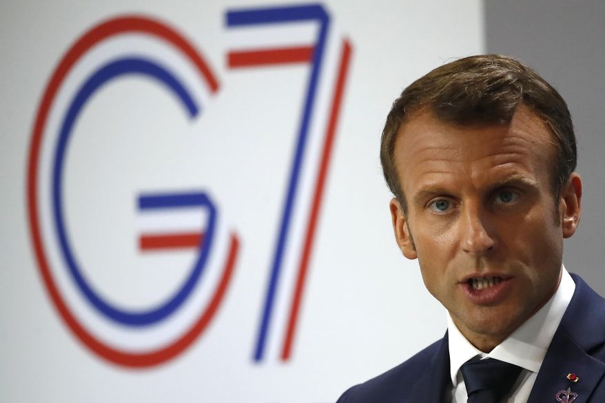 French President Emmanuel Macron speaks during his final press conference at the G7 summit Monday, Aug. 26, 2019 in Biarritz, southwestern France. (AP Photo/Francois Mori)