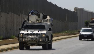 Spanish U.N peacekeepers patrol the Lebanese side of the Lebanese-Israeli border in the southern village of Kfar Kila, Lebanon, Monday, Aug. 26, 2019. Lebanon&#39;s state-run National News Agency said Monday that Israel&#39;s air force attacked a Palestinian base in the country&#39;s east near the border with Syria. Lebanese President Michel Aoun told the U.N. Special Coordinator for Lebanon, Jan Kubis, that the attacks violate a U.N. Security Council resolution that ended the 2006 war between Israel and Hezbollah. (AP Photo/Mohammed Zaatari)
