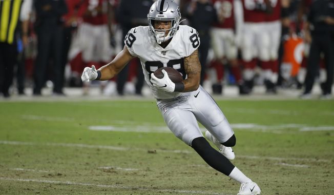 FILE - In this Aug. 15, 2019, file photo, Oakland Raiders wide receiver Keelan Doss (89) runs with the ball during an an NFL preseason football game against the Arizona Cardinals in Glendale, Ariz. After winning just four games last season and holding four picks in the top two rounds of the NFL draft, the Raiders figured to have plenty of opportunities for rookies to contribute. (AP Photo/Rick Scuteri, File)