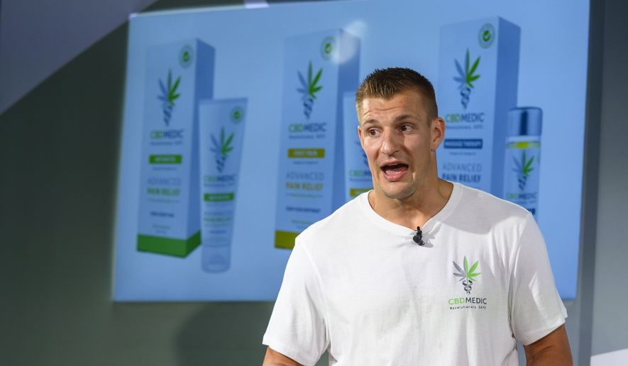 Former New England Patriots tight end Rob Gronkowski holds a news conference announcing his advocacy for CBD and becoming an investor in Abacus Health Products, the maker of CBDMEDIC, Tuesday, Aug. 27, 2019, in New York. (AP Photo/Corey Sipkin)
