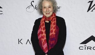 FILE - This April 13, 2018 file photo shows author Margaret Atwood at Variety&#39;s Power of Women: New York event in New York. Literary agent Lynn Nesbit, Atwood and some of the forces behind the Hulu adaptation of her novel “The Handmaid’s Tale” will be this year’s honorees at the Center for Fiction’s benefit and awards dinner. The ceremony will be held Dec. 10. (Photo by Evan Agostini/Invision/AP, File)