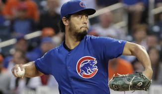 Chicago Cubs&#39; starting pitcher Yu Darvish winds up during the second inning of a baseball game against the New York Mets, Tuesday, Aug. 27, 2019, in New York. (AP Photo/Kathy Willens)
