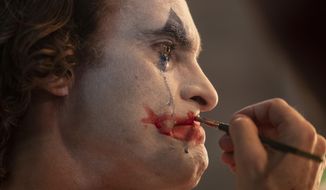 Joaquin Phoenix portrays the Joker, a maniacal genius destined to haunt Gotham City in the world of DC Comics. (Associated Press/File)