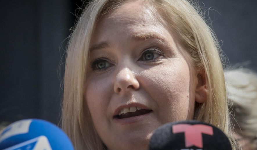 Virginia Roberts Giuffre, a sexual assault victim, speak during a press conference outside a Manhattan court where sexual victims, on invitation of a judge, addressed a hearing after the accused Jeffrey Epstein killed himself before facing sex trafficking charges, Tuesday Aug. 27, 2019, in New York. (AP Photo/Bebeto Matthews)