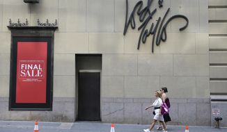 FILE - In this Oct. 4, 2018, file photo signs advertising the closing of a Lord &amp;amp; Taylor store are displayed in New York, Thursday. Lord &amp;amp; Taylor, one of the nation’s oldest department stores, is being sold for $100 million. The retailer’s owner, Hudson&#39;s Bay Co., says it reached a deal with online rental clothing company Le Tote Inc.  (AP Photo/Seth Wenig, File)