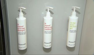 This image made from video shows bottles of shampoo, conditioner and shower gel that will replace smaller bottles of them by 2021, filmed at Marriott&#39;s headquarters in Bethesda, Md., Tuesday, Aug. 27, 2019. Marriott International, the world&#39;s largest hotel chain, said Wednesday it will eliminate small plastic bottles of shampoo, conditioner and bath gel from its hotel rooms worldwide by December 2020. They’ll be replaced with larger bottles or wall-mounted dispensers, depending on the hotel. (AP Photo/Dan Huff)