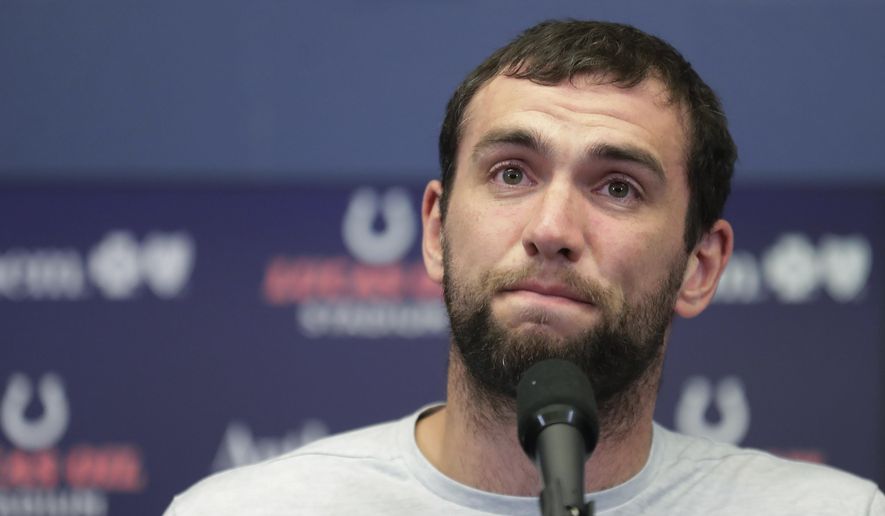 FILE - In this Saturday, Aug. 24, 2019, file photo, Indianapolis Colts quarterback Andrew Luck speaks during a news conference following the team's NFL preseason football game against the Chicago Bears, in Indianapolis. The Colts launch into the post-Luck era with his successor on the bench. Coach Frank Reich plans to sit Jacoby Brissett against the Bengals on Thursday night, the Colts’ first game since Andrew Luck announced his retirement. Either Phillip Walker or Chad Kelly will start, competing for the No. 2 job. (AP Photo/Michael Conroy, File)