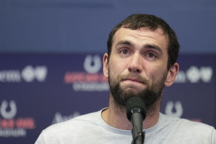 FILE - In this Saturday, Aug. 24, 2019, file photo, Indianapolis Colts quarterback Andrew Luck speaks during a news conference following the team's NFL preseason football game against the Chicago Bears, in Indianapolis. The Colts launch into the post-Luck era with his successor on the bench. Coach Frank Reich plans to sit Jacoby Brissett against the Bengals on Thursday night, the Colts’ first game since Andrew Luck announced his retirement. Either Phillip Walker or Chad Kelly will start, competing for the No. 2 job. (AP Photo/Michael Conroy, File)