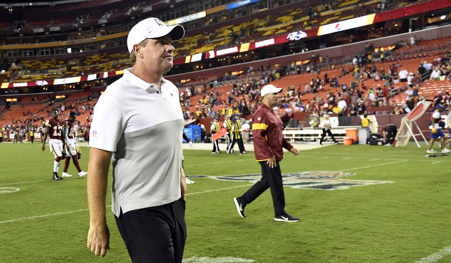 Washington Redskins head coach Jay Gruden walks off of the field following an NFL preseason football game against the Baltimore Ravens at FedEx Field in Landover, Md., Thursday, Aug. 29, 2019. The Ravens beat the Redskins, 20-7. (AP Photo/Susan Walsh)