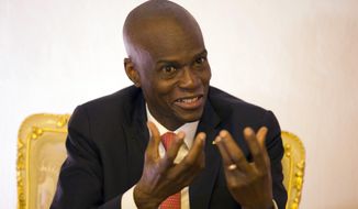 Haiti&#39;s President Jovenel Moise speaks during an interview in his office in Port-au-Prince, Haiti, Wednesday, Aug. 28, 2019. Moise told The Associated Press Wednesday that he will serve out his term despite rising violence, poor economic performance and months of protests over unresolved allegations of corruption in his predecessor’s administration. (AP Photo/Dieu Nalio Chery)