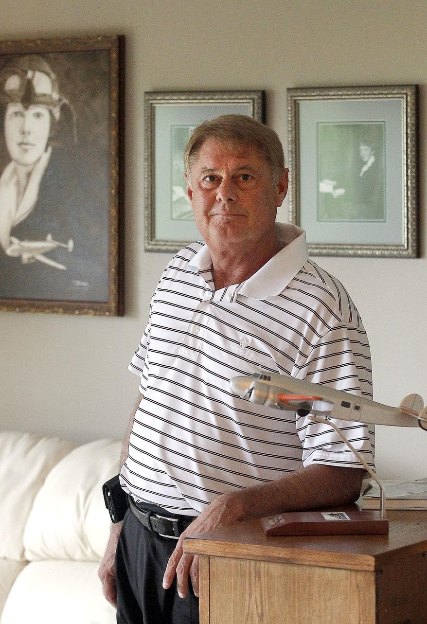 FILE - In this Friday, June 12, 2015 file photo, Michigan State Representative Larry Inman is seen in his Traverse City, Mich, area home. The Michigan House has approved a resolution urging Inman to resign as he faces federal charges over an alleged scheme to trade votes for campaign money. (Jan-Michael Stump/Traverse City Record-Eagle via AP, File)