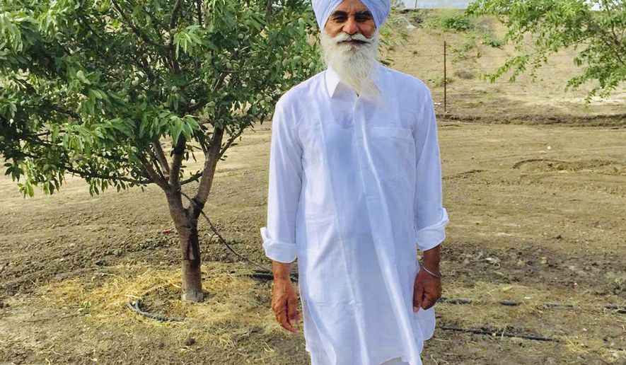 In this undated photo provided by United Sikhs is Parmjit Singh. Members of the Sikh community are asking the FBI to investigate the death of Singh, who was killed during a nighttime walk at a Northern California park. A candlelight vigil was held Wednesday evening, Aug. 28, 2019, for Singh, who was fatally stabbed Sunday night in Gretchen Talley Park in Tracy, Calif., in the Central Valley east of San Francisco. (Harnek Singh Kang/United Sikhs via AP)