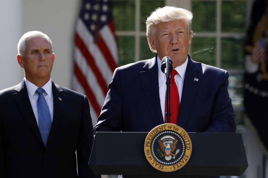 President Donald Trump says he is postponing his weekend trip to Poland and will send Vice President Mike Pence in his place during a event to announce the establishment of the U.S. Space Command in the Rose Garden of the White House in Washington, Thursday, Aug. 29, 2019. (AP Photo/Carolyn Kaster)