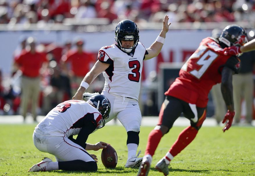 FILE - In this Dec. 30, 2018, file photo, Atlanta Falcons' Matt Bryant (3) kicks a field goal against the Tampa Bay Buccaneers during the first half of an NFL football game in Tampa, Fla. The Falcons are bringing back veteran kicker Matt Bryant after failing to find his successor during the preseason. The team has agreed to terms with the 44-year-old Bryant, who made 20 of 21 field-goal attempts in 2018. (AP Photo/Jason Behnken, file)