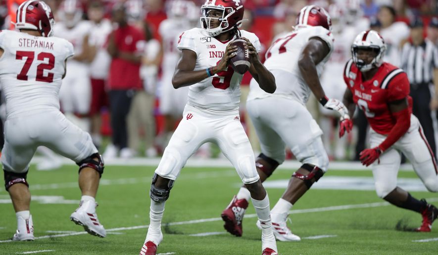 Indiana quarterback Michael Penix Jr. (9) throws against Ball State during the second half of an NCAA college football game in Indianapolis, Saturday, Aug. 31, 2019. Indiana defeated Ball State 34-24. (AP Photo/Michael Conroy)
