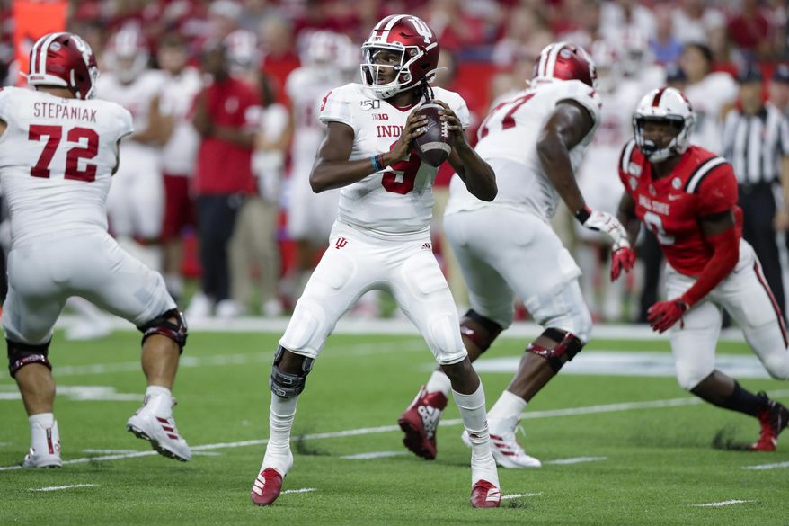 Indiana quarterback Michael Penix Jr. (9) throws against Ball State during the second half of an NCAA college football game in Indianapolis, Saturday, Aug. 31, 2019. Indiana defeated Ball State 34-24. (AP Photo/Michael Conroy)